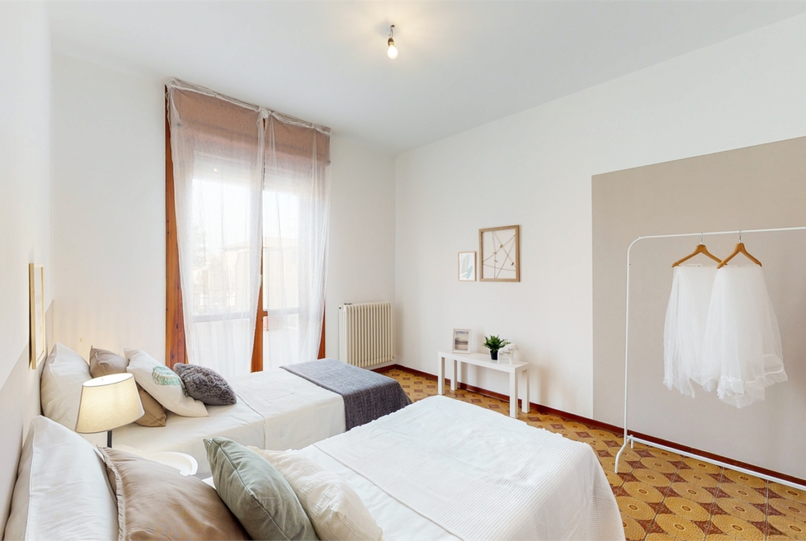 APPARTAMENTO CON TERRAZZO DI 90MQ E GARAGE